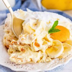 a white plate topped with bananas and ice cream