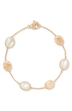 With textured round discs and glowing mother-of-pearl insets, this 18-karat gold bracelet is ready to be an everyday accessory. 18k gold/mother-of-pearl Made in Italy Marco Bicego, Everyday Accessories, Pearl Bracelet, Womens Jewelry Bracelets, Mother Of Pearl, Gold Bracelet, 18k Gold, In Italy, Size 7