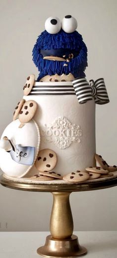 a cake decorated with cookies and an evil cookie monster