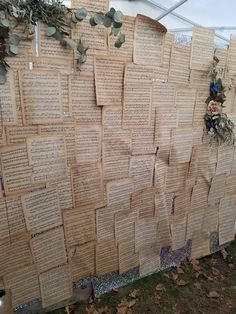 an old wall covered in lots of paper