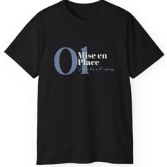 a black t - shirt with the words wisen place in blue and white on it