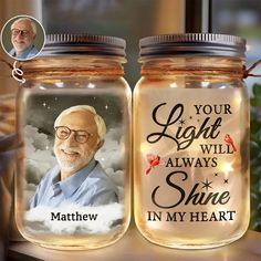 two mason jars with the words, your light will always shine in my heart