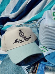 Motor Boatin' Yacht Club Trucker In collaboration with Aubrey Schoenekase! Perfect hat for ALL summer long! Especially for you lake goers! Baby blue vintage with navy embroidery Blue Vintage Baseball Cap For The Beach, Retro Blue Trucker Hat For Beach, Vintage Blue Baseball Cap For Summer, Retro Blue Hat With Embroidered Logo, Retro Blue Hats With Embroidered Logo, Blue Retro Hat With Embroidered Logo, Blue Baseball Cap With Short Brim For Beach, Blue Short Brim Baseball Cap For The Beach, Navy Summer Baseball Cap