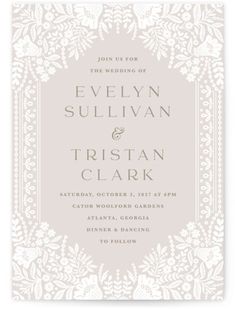 a wedding card with an ornate frame on the front and bottom, in white ink