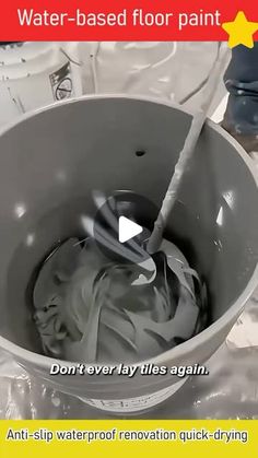 a video demonstrating how to use a water - based floor paint