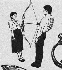 a man and woman standing next to each other holding a bow