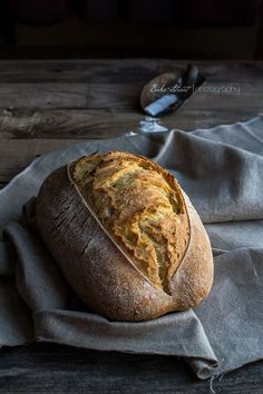 a loaf of bread sitting on top of a cloth