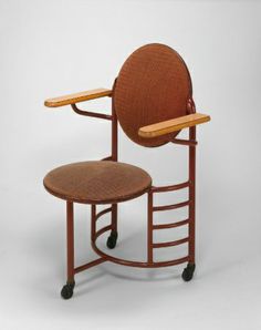 a chair that is on wheels with a wooden seat