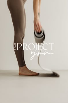 a woman in tights is holding a hair dryer