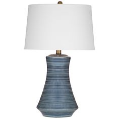 a blue lamp with a white shade on it