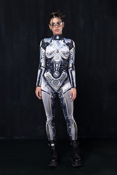 The Warbot System 46 Costume is the perfect addition to ur next cosplay fit or Halloween outfit. Features: Mock Neckline Robust & Hidden Back Zipper Closure Long Sleeves UV Black Light Reactive 82% Polyester 18% Elastane Non-Transparent Italian Lycra 30° Cold Wash, Hang dry Scifi Costume, Robot Fashion, Robot Costume, Dark Costumes, Sci Fi Costume, Rave Bodysuit, Robot Costumes, Edm Fashion, Robot Print