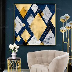 a modern living room with blue walls, gold accents and a marble chair in the corner