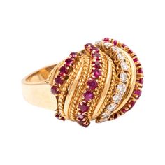 This Van Cleef & Arpels ring contains 12 round brilliant cut diamonds weighing approximately 0.25 carats total and 36 round mixed cut rubies mounted in yellow gold. Engraved Van Cleef & Arpels Made in France. Size 6. With inscription number 32101 and 18k gold stamp Van Cleef Arpels Ring, Van Cleef Arpels Diamond, Van Cleef & Arpels, Van Cleef And Arpels, Van Cleef Arpels, Pretty Rings, Van Cleef, Yellow Gold Ring, Round Brilliant Cut Diamond