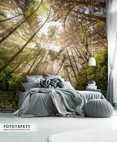 a bedroom with trees and sunlight coming in through the window wallpaper mural decal