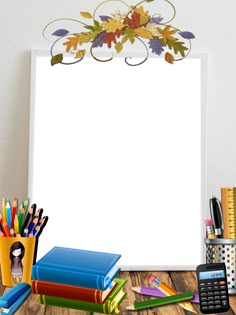 an empty paper surrounded by school supplies on a wooden table