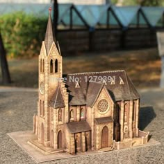 a small model of a church on a table