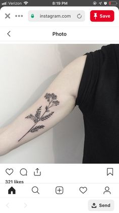 a person with a flower tattoo on their arm