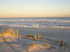 the beach is covered in snow and sand