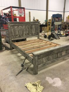 the bed frame is made out of wood