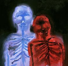 two people standing next to each other in front of a dark background