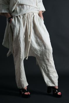 Linen Harem Pants, Wide linen pants, Natural Linen Pants. Harem Linen Pants with elastic waist and tie rope. SIZE & FIT: *Our Model is 5′6″ / 175 cm and wears size M. *Available Sizes: form XS up to 8XL *This product could be customized according to your measurements. *Please leave your requirements in the checkout. CARE Dry Cleaning Machine Wash 30oC Hand Wash with warm water Medium hot iron Time to ship & DELIVERY : Your piece will be ready to ship in 5-6 biz days upon placing your ord Baggy Drawstring Wide-leg Harem Pants, Baggy Drawstring Wide-leg Pants, Baggy Wide-leg Drawstring Pants, Baggy Wide-leg Pants With Drawstring, Relaxed Fit Tapered Leg Bottoms With Tie Waist, Cotton Pants With Tie Waist And Tapered Leg, Beige Pants With Pull-on Style And Loose Fit, Relaxed Fit Straight Pants With Tie Waist, Loosely Fitted Ankle-length Harem Pants With Drawstring