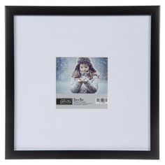 a white and black frame with a girl in the snow