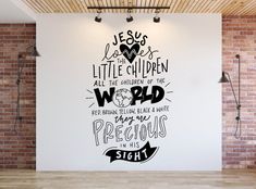 a large wall decal with the words jesus is the little children in the world