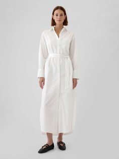 Soft poplin cotton maxi shirtdress.  Point collar, button front.  Long sleeves.  Patch pocket at chest.  Tie belt at waist.  Slant pockets.  Curved hem.  Made with 100% organically grown cotton, which is grown without the use of synthetic pesticides and fertilizers.  * Fit: Classic.  A shift silhouette with a straight & easy fit.  Hits at the ankle.  Models wearing Gap Shirt Dress Outfit, Cotton Long Dress, Cotton Maxi, Fit Inspo, Long Shirt, The Gap, Toddler Gifts, Tie Belt, Everyday Outfits