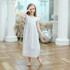 Keep your little one cool and comfortable on summer nights with our "Belle" Nightdress. Made of soft white cotton and featuring delicate broderie detailing. This nightdress is perfect for warmer weather. The short flutter sleeves add a touch of sweetness to this essential piece for any little girl's sleepwear collection. Item Type: Nightdress Material: Cotton Broderie Fit: Fits true to size, take your normal size Length: Mid-Calf Age Range: 3 Years-12 Years Girls Nightgown, Girls Sleepwear, Sleep Dress, Home Dress, Cotton Embroidery, Summer Nights, Flutter Sleeve, Night Dress, Kids Dress