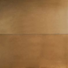 an abstract painting with gold and brown tones