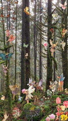 many fairy figurines in the woods surrounded by moss and trees with butterflies on them