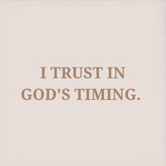 the words i trust in god's time are shown on a white background with brown lettering