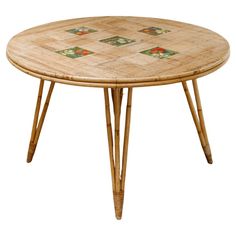 a bamboo table with floral designs on it