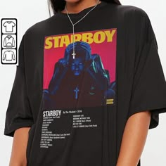 a woman wearing a black shirt with a starboy poster on it