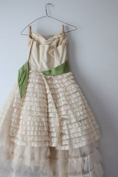 "dream dress lacey and lovely good condition/ with wear/ see pics/ priced as is easy care and wear a great wedding dress too :) small frame. please check measurements below zipper back easy wear this has wear antique dream 32-34\"bust 25\"waist 38\"long Thank YOU and please feel free to ask me any ?s:) Have a lovely day!! xoxo www.etsy.com/shop/retroandme" 1950s Style Sleeveless Wedding Dress, Summer Wedding Vintage Dress, Tea Length, Summer Wedding Vintage Tea Length Dress, Summer Wedding Vintage Tea-length Dress, Vintage Dress For Garden Party, Vintage Lined Wedding Dress, Vintage Wedding Dresses, Lined, Vintage Dress With Lined Bodice For Garden Party, Retro Dresses With Lace Trim For Garden Party