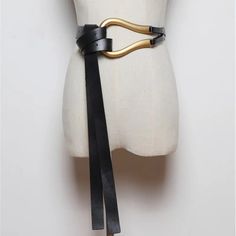 Upgrade your fashion game with our stunning black leather tie belt! Made from premium-quality leather, the soft and durable material offers a comfortable and stylish fit. The gold-tone belt buckle adds a touch of luxury and elegance to any outfit, making it perfect for both formal and casual occasions. Whether you're dressing up or down, our belt has got you covered. Women Belts Fashion, Big Buckle Belt, Shirt Knot, Woman Personality, Wrap Belt, Layered Fashion, Faux Leather Belts, Fashion Pattern, Leather Belts