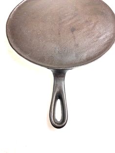 an old frying pan on a white background