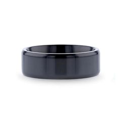 black ceramic wedding ring with silver inlays on an isolated white background - product images