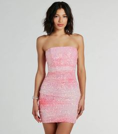 You'll be a gorgeous enchanting muse in this glam iridescent sequin mini dress! It features a strapless straight-across neckline with flexible boning inserts at the bodice to provide structure, ruching down the side seams, a mini-length hem, and a bodycon silhouette to flaunt your figure. The lined mesh fabric features all-over iridescent sequin embroidery to give off a stunning ombre effect. Complete your party look with platform heels!Fit & FeaturesStrapless straight-across neckline, no-sl Sparkly Mini Dress Prom, Sparkly Pink Dress Homecoming, Hot Pink Glitter Mini Dress, Glam Dresses Short Windsor, Hot Pink Mini Dress Prom, Short Hot Pink Sequin Dress, Sparkley Dress Hoco, Irredescent Homecoming Dress, Iredesant Homecoming Dress