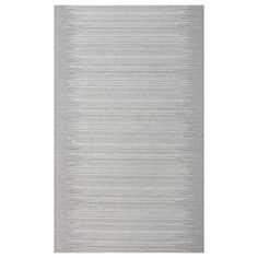 a gray rug with white stripes on it