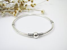 Simple but chic sterling silver bangle for everyday dress up; Brand: ANKA; Metal: good quality solid 925 sterling silver; "925" stamped; Measurement: 60mm with open closure; Colour as shown; In Gift Box Packing; Cleaning and polishing with sterling silver cloth after wear We have more silver items and amber collection at our Etsy shop: https://www.etsy.com/shop/CharmPlus Silver Nickel-free Bangle, Unique Nickel-free Silver Bangle, Antique Silver Nickel-free Bangle Bracelet, Nickel-free Silver Bangle Charm Bracelet, Vintage Sterling Silver Nickel-free Bangle, Bangle Silver, Everyday Dress, Silver Items, Box Packing