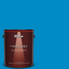 a blue paint with the words marquee on it and a red canister