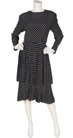 "This 1980s Guy Laroche Boutique long sleeve dress was made in France of a black and white polka-dot crêpe de chine. It features a pleated tiered skirt. The dress does up the back with seven fabric-covered buttons and a hidden zipper up the back of the skirt. There is a button on each cuff. It's in excellent condition, has been professionally dry-cleaned and is ready to wear. Measurements: Bust - 42\" Waist - 33.5\" Hips - 42.5\" Shoulders - 17\" Arms - 22.5\" Waist-to-hem - 27\" Total length- 4 Vintage Polka Dot Long Sleeve Dresses, Vintage Long Sleeve Polka Dot Dress, Silk Chiffon Scarves, Leather Blazer Jacket, Guy Laroche, Chiffon Scarf, Fabric Covered Button, 1980s Vintage, Tiered Skirt