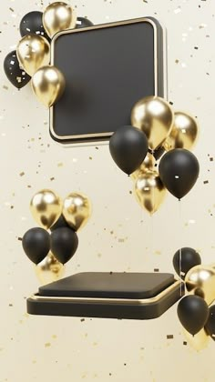 black and gold balloons floating in the air next to a cell phone on a shelf