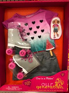 a barbie doll in a box with clothes and shoes