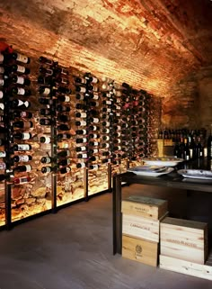 a wine cellar filled with lots of bottles