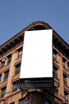 an empty billboard on the side of a building