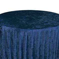 Revamp your event décor with the stunning beauty of our crushed velvet 132-inch round tablecloths – navy blue. The velvety texture and dazzling color combination provide a euphoric and romantic event setting. We continually strive to offer high-quality rental standard tablecloths and our crushed velvet, also known as panne velvet tablecloths, is no exception! Our navy blue 132-inch round crushed velvet tablecloths are primarily designed to provide a floor-length drop on a standard 6-foot round banquet table. However, these velvet tablecloths are also ideal for highboy cocktail tables. Our 132-inch round crushed velvet tablecloths can be draped over a 36-inch highboy cocktail table to create a 6-inch puddle on the ground which can be tied in the center with our selection of sashes for a bea Velvet Tablecloth, Velvet Table, Round Tablecloths, Fitted Table Cover, Navy Blue Velvet, Round Table Covers, Wedding Reception Tables, Tablecloth Fabric, Blue Bridal