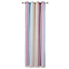 three different colored curtains hanging from the side of a wall with metal rods on it