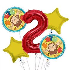 the number 2 balloon bouquet is filled with balloons and heliums for an animal themed 2nd birthday party